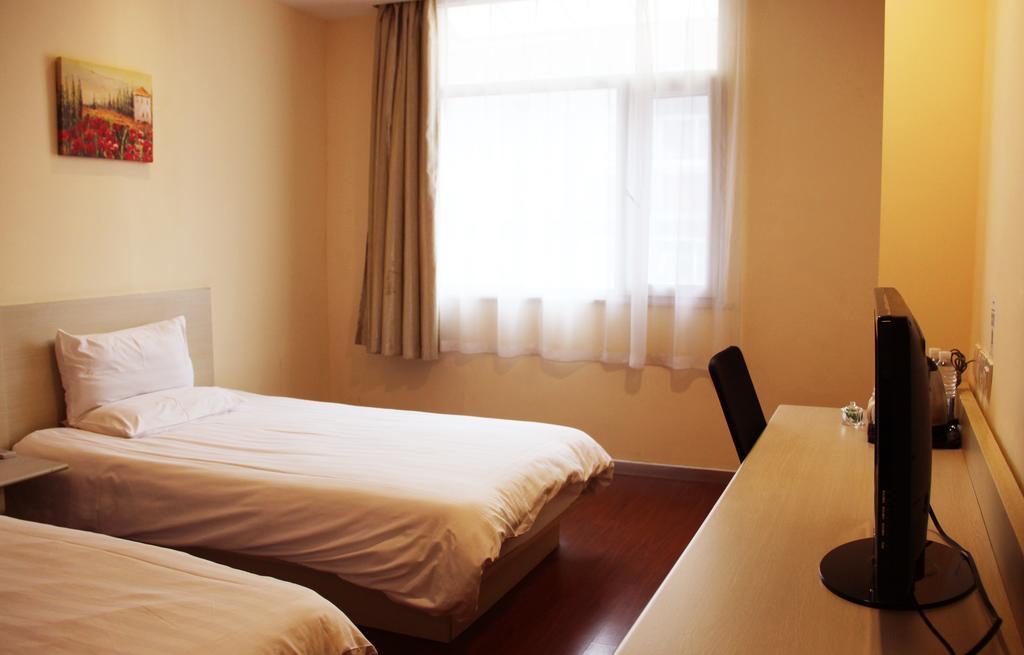 Hanting Hotel Dalian Olympic Square Hotel Номер фото